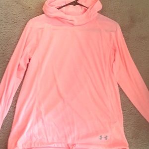 A NWOT Under Armor ladies top.